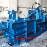 double compression baling press